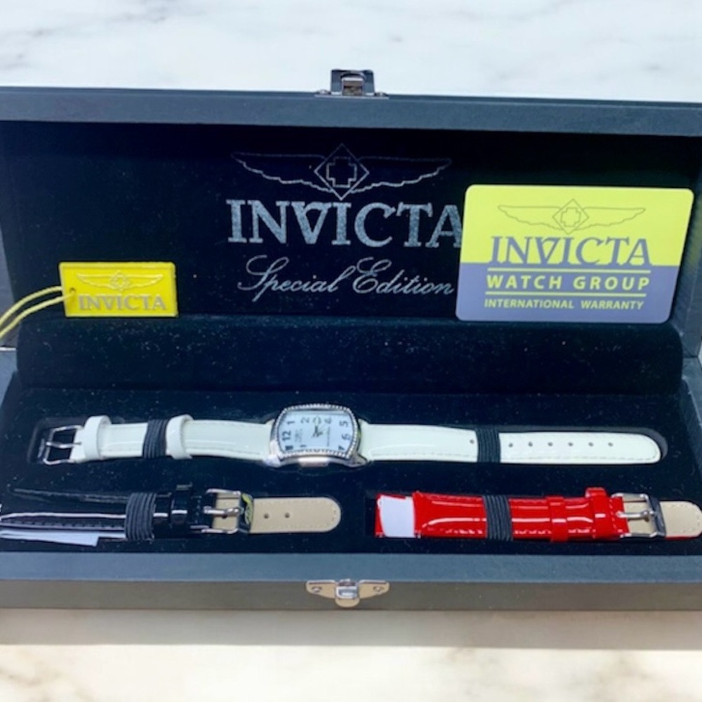 Women’s Invicta Silver and White Watch Set with interchangeable straps.